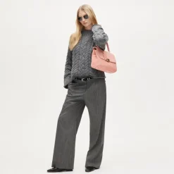 2025 Rollneck™ cable-knit sweater
