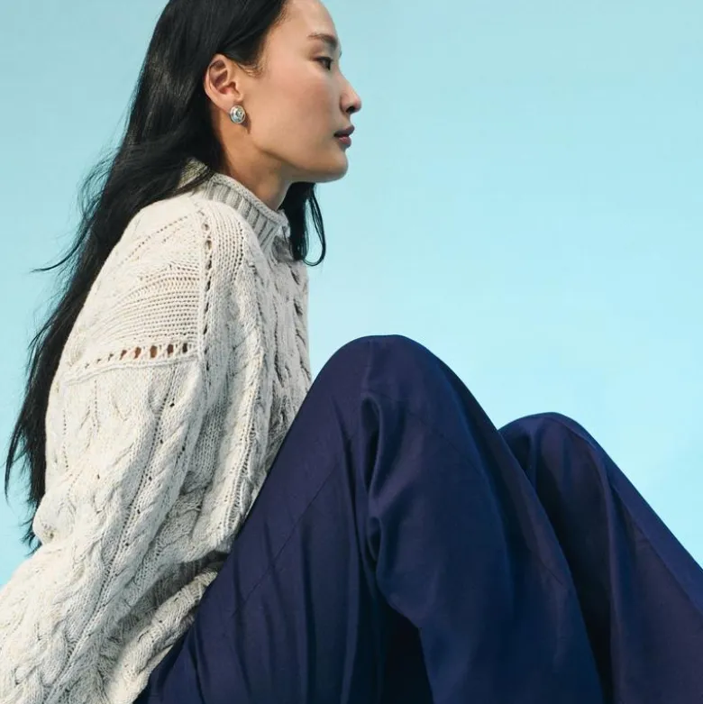 2025 Rollneck™ cable-knit sweater in marled heritage cotton