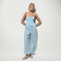 Beach pant with pom-poms