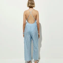 Beach pant with pom-poms