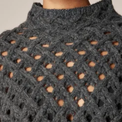 Cross-cable mockneck sweater in wool blend