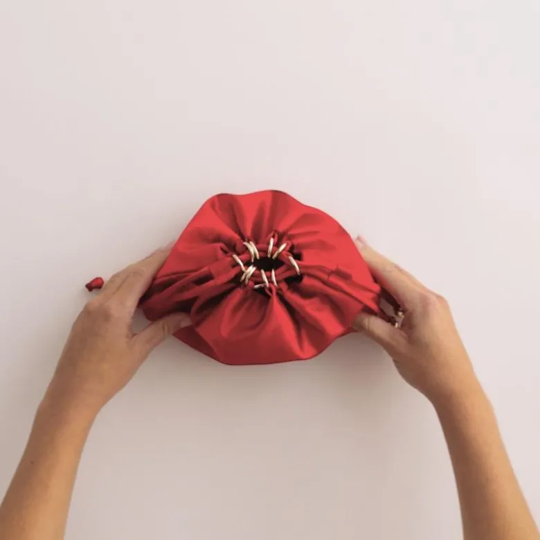 Drawstring pouch bag in satin
