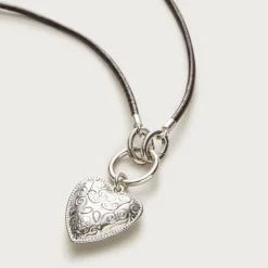 Engraved heart necklace with leather cord