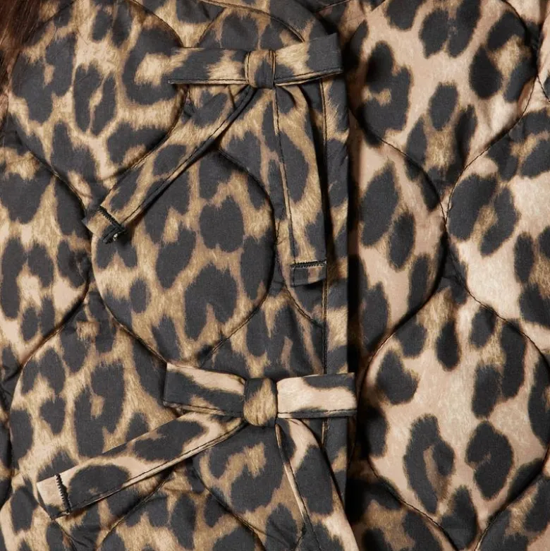 Girls' quilted vest in leopard print with PrimaLoft®