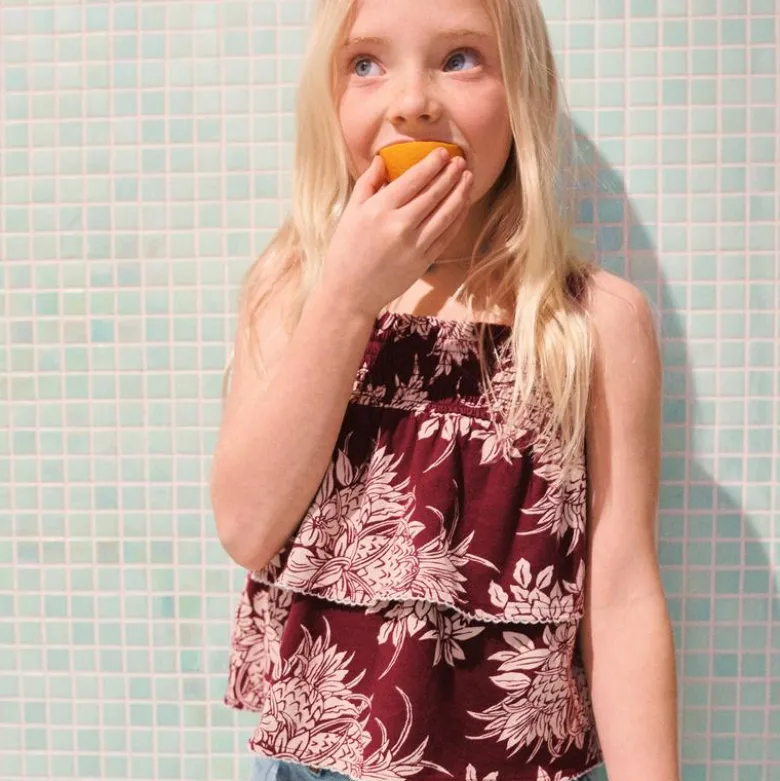 Girls' tiered smocked top in broken-in jersey