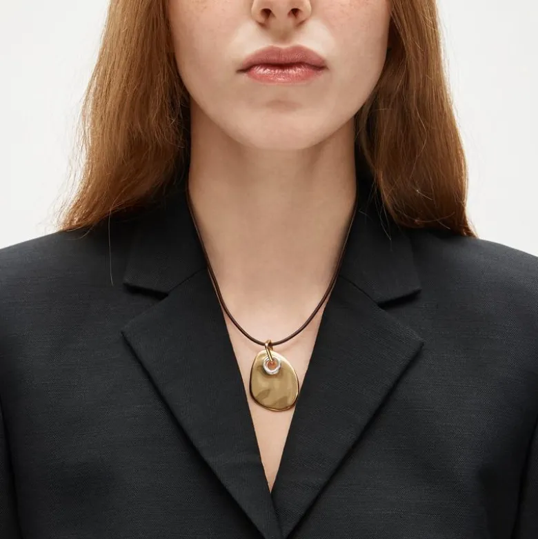 Grommet pendant necklace with leather cord