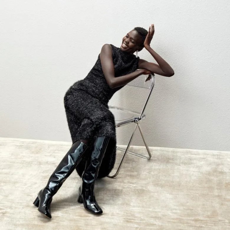 Knee-high round-heel boots in patent leather