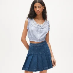Pleated denim mini skirt