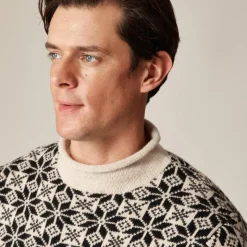 Rollneck™ sweater in snowflake jacquard lambswool
