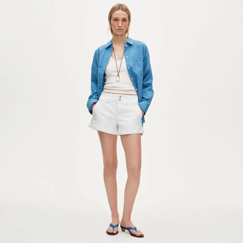 Stacked-button denim short in white