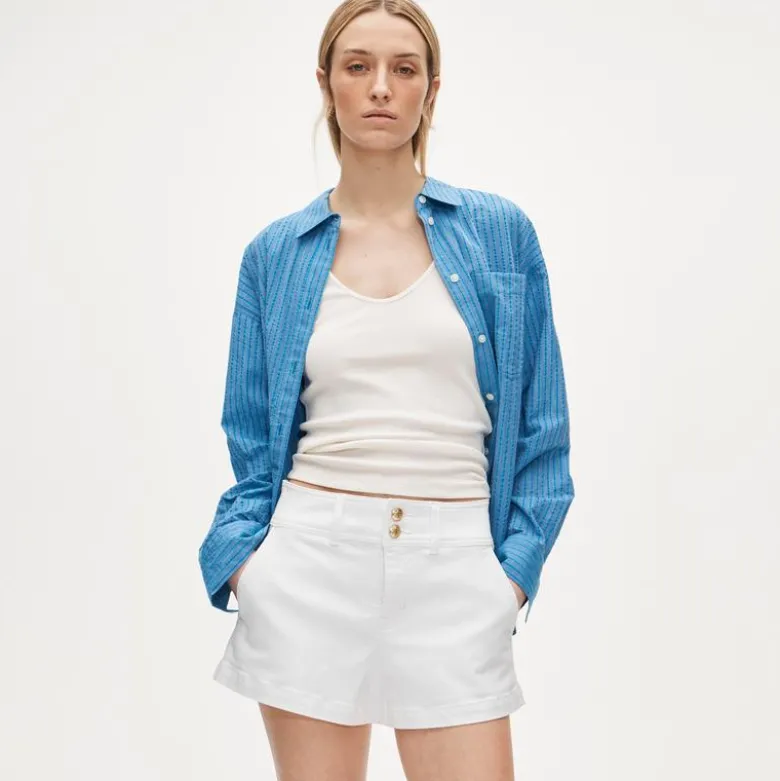 Stacked-button denim short in white