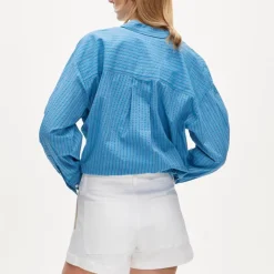 Stacked-button denim short in white