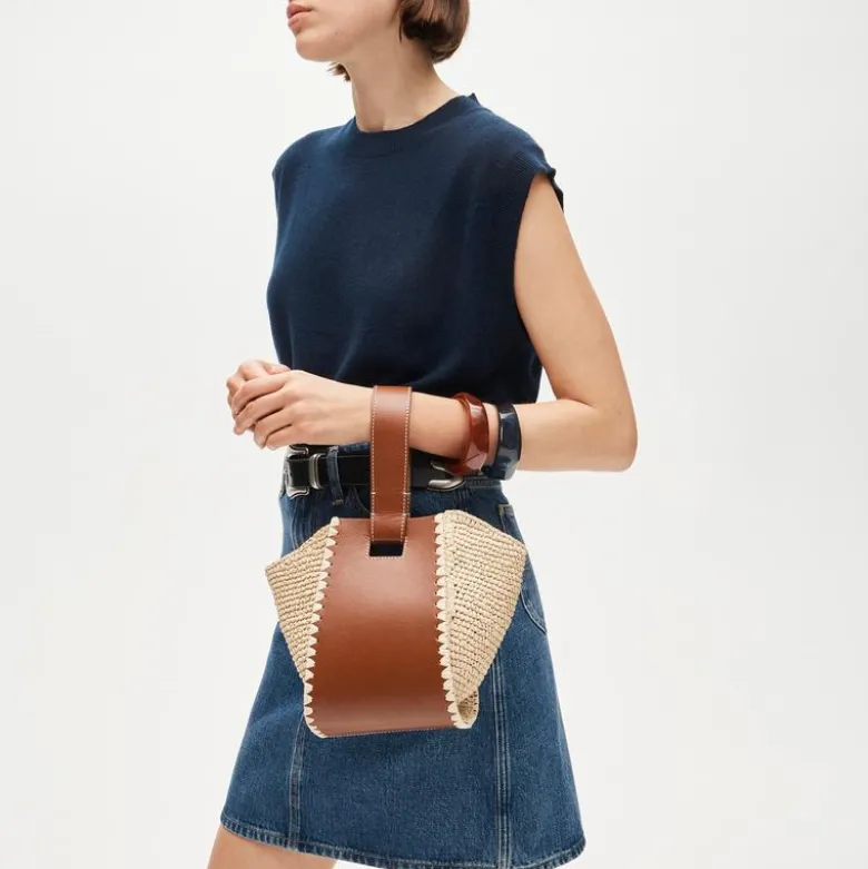 Top-handle bag in handknotted straw and leather