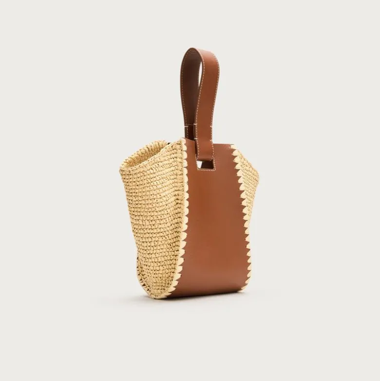 Top-handle bag in handknotted straw and leather